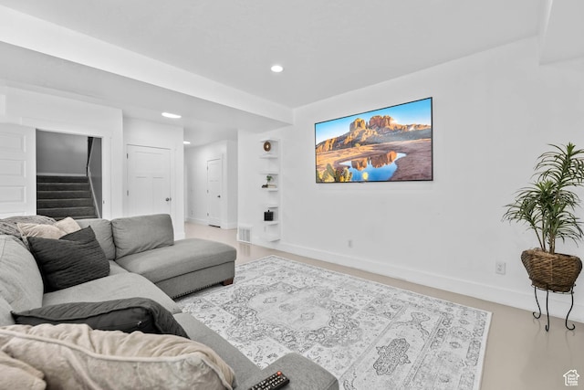 9447 N Arrowhead Dr, Eagle Mountain, UT 84005 - living area featuring stairway, baseboards, recessed lighting, and built in features