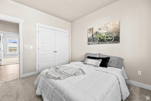 9447 N Arrowhead Dr, Eagle Mountain, UT 84005 - carpeted bedroom with baseboards and a closet