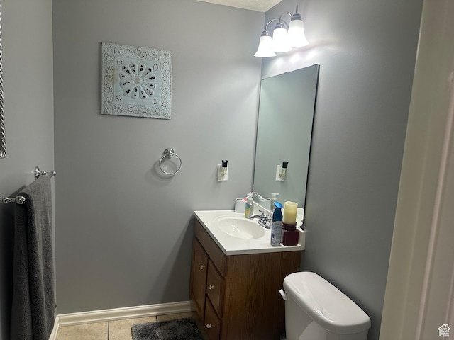 3863 W Augusta Dr S, Syracuse, UT 84075 - bathroom with vanity, tile patterned flooring, toilet, and baseboards