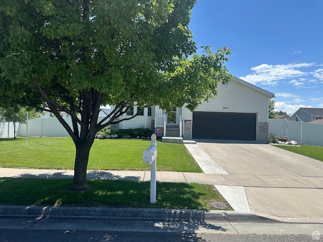 3863 W Augusta Dr S, Syracuse, UT 84075 - obstructed view of property featuring driveway and a garage