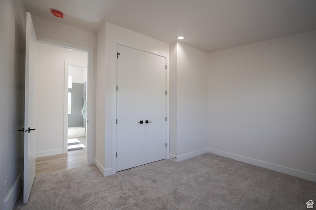 5866 N Fork Rd, Eden, UT 84310 - unfurnished bedroom featuring carpet, a closet, baseboards, and recessed lighting
