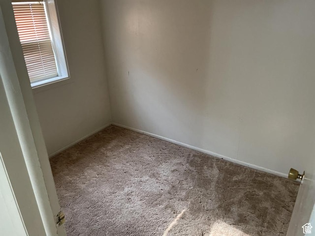 133 W Forest St, Brigham City, UT 84302 - carpeted empty room with baseboards