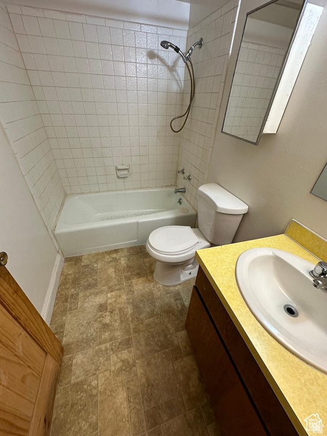 133 W Forest St, Brigham City, UT 84302 - full bath with tub / shower combination, vanity, toilet, and stone finish floors