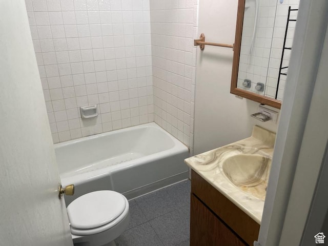 133 W Forest St, Brigham City, UT 84302 - bathroom with vanity, toilet, tile patterned floors, and shower / washtub combination