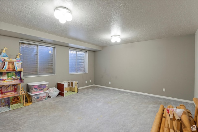 1767 E 2825 N, Layton, UT 84040 - playroom featuring carpet flooring, a textured ceiling, and baseboards