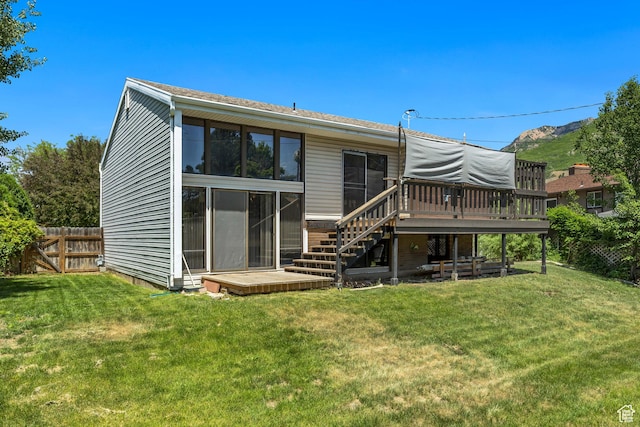 1063 Oxford Dr, Ogden, UT 84403 - back of property with a deck and stairway