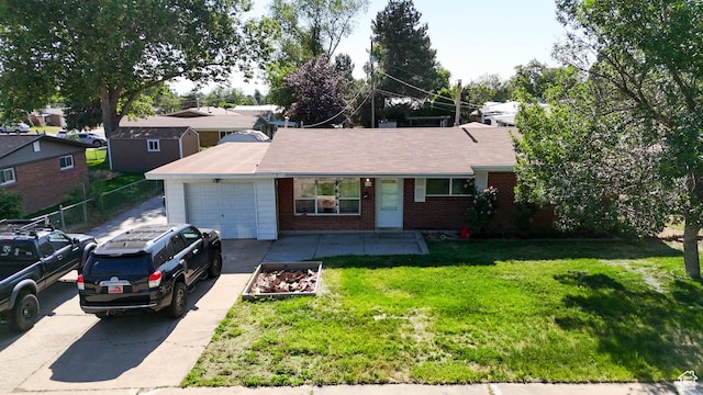 636 N 200 W, Clearfield, UT 84015 - single story home with a garage, brick siding, and driveway