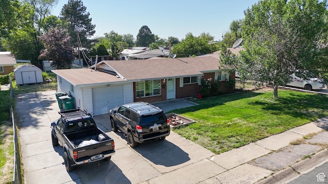 636 N 200 W, Clearfield, UT 84015 - ranch-style home featuring an attached garage, concrete driveway, a front lawn, and brick siding