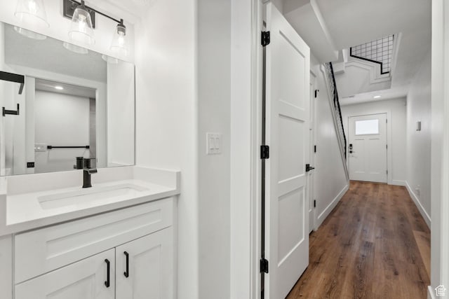 622 E 340 S, American Fork, UT 84003 - bathroom featuring wood finished floors, vanity, recessed lighting, and baseboards