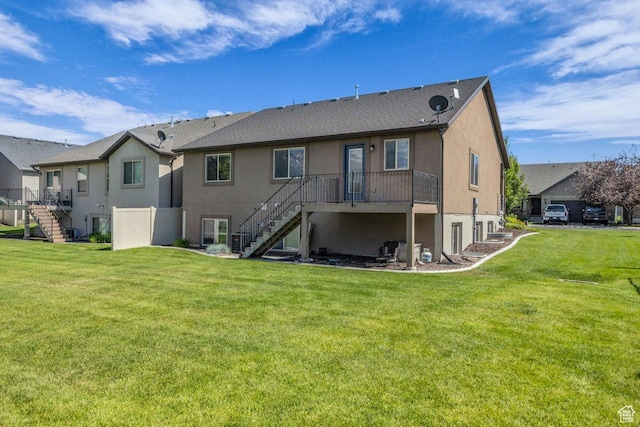 1848 W 645 S, Orem, UT 84059 - rear view of property featuring stairway, stucco siding, and a yard