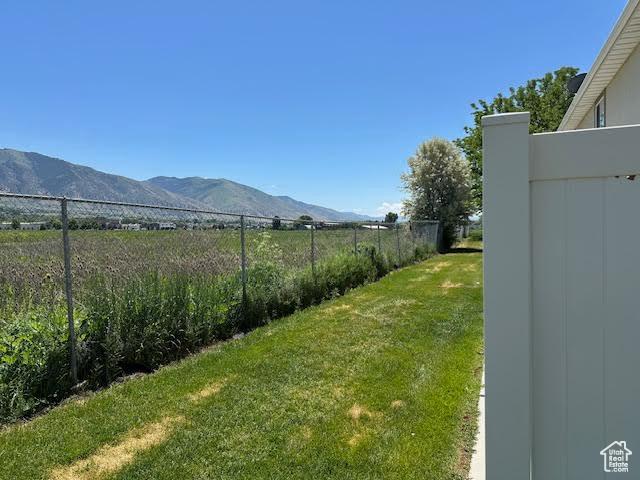 49 W 1315 S, Logan, UT 84321 - view of yard with a mountain view