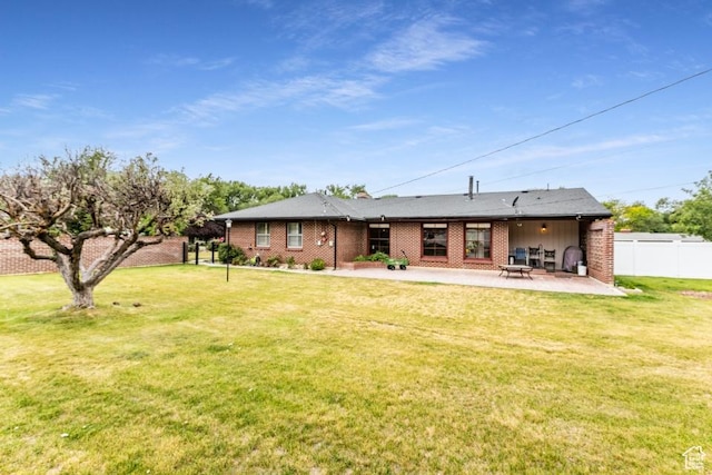 611 E 100 N, Brigham City, UT 84302 - back of house with a patio area and brick siding