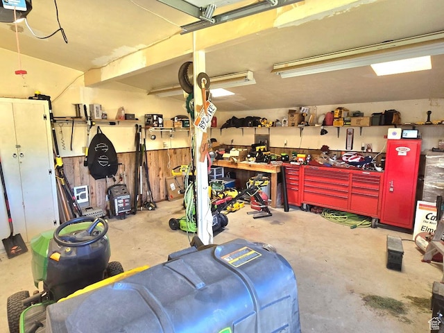 611 E 100 N, Brigham City, UT 84302 - garage with a workshop area and a garage door opener