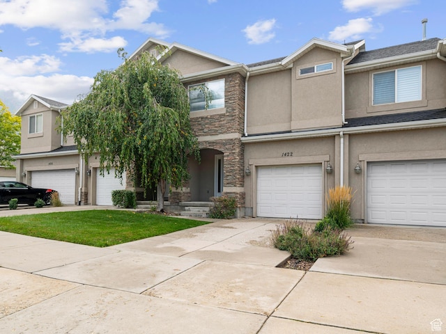 1422 E 1200 S, Provo, UT 84606 - multi unit property with a garage, stucco siding, driveway, stone siding, and a front yard