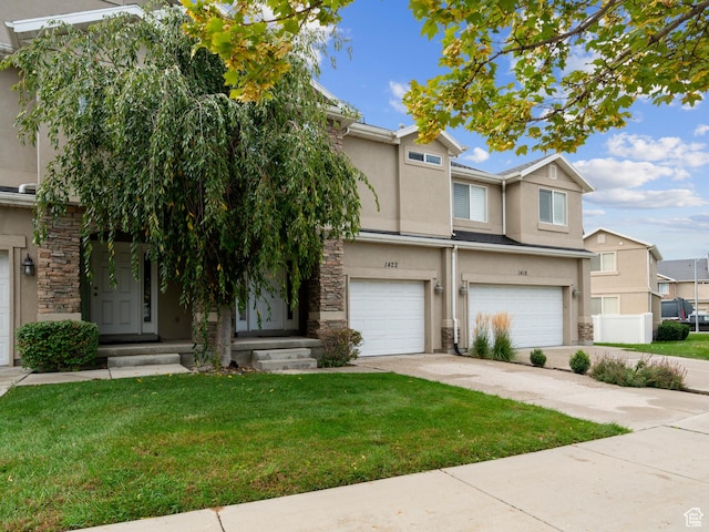 1422 E 1200 S, Provo, UT 84606 - multi unit property with stone siding, a garage, stucco siding, and driveway