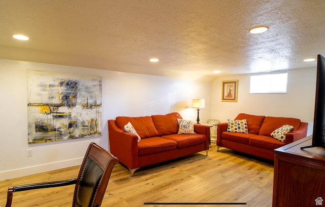 331 W Elberta Dr, Pleasant View, UT 84414 - living room featuring recessed lighting, light wood-style flooring, baseboards, and a textured ceiling