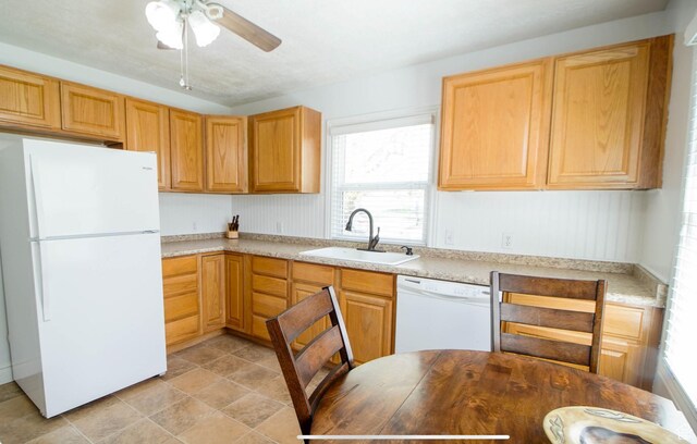 331 W Elberta Dr, Pleasant View, UT 84414 - kitchen featuring white appliances, a sink, light countertops, and a ceiling fan