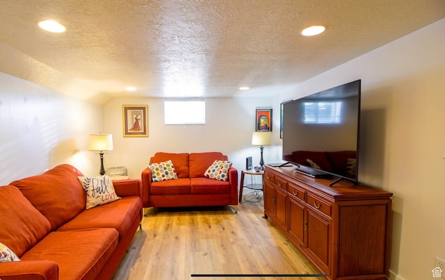 331 W Elberta Dr, Pleasant View, UT 84414 - living room with a textured ceiling, light wood finished floors, and recessed lighting