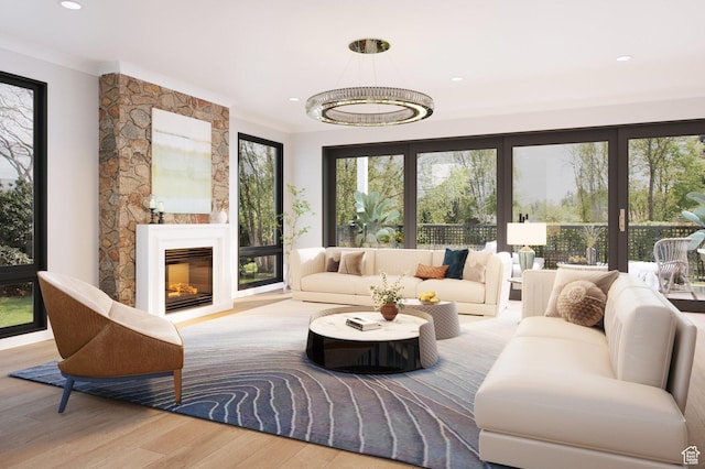 4169 W Discovery Way Unit 302, Park City, UT 84098 - living area featuring wood finished floors, ornamental molding, a large fireplace, and recessed lighting