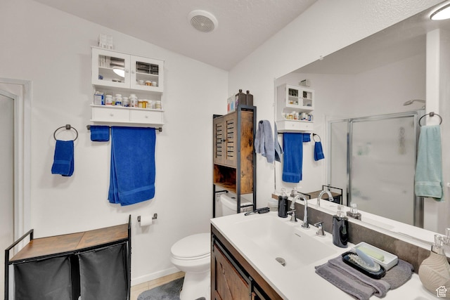 1589 E Ridgefield Rd, Spanish Fork, UT 84660 - bathroom featuring a shower stall, vanity, vaulted ceiling, and tile patterned flooring
