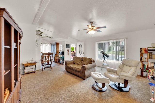 1589 E Ridgefield Rd, Spanish Fork, UT 84660 - living area with light colored carpet, plenty of natural light, ceiling fan, and vaulted ceiling