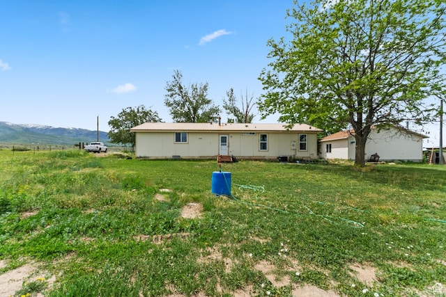 1665 E 1280 N, Mount Pleasant, UT 84647 - rear view of property featuring a yard, a mountain view, and central AC