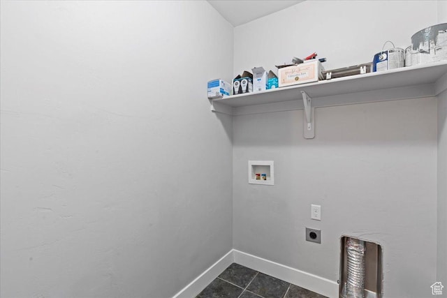 4746 W S Jordan Pkwy, South Jordan, UT 84009 - washroom with hookup for an electric dryer, washer hookup, dark tile patterned flooring, and baseboards