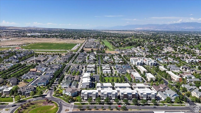 4746 W S Jordan Pkwy, South Jordan, UT 84009 - aerial view of property's location featuring a mountain backdrop and nearby suburban area