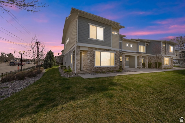 1712 W Naxos Ln, South Jordan, UT 84095 - rear view of property with stone siding