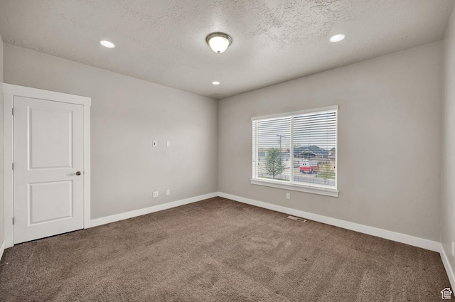 1712 W Naxos Ln, South Jordan, UT 84095 - spare room featuring carpet flooring, baseboards, a textured ceiling, and recessed lighting