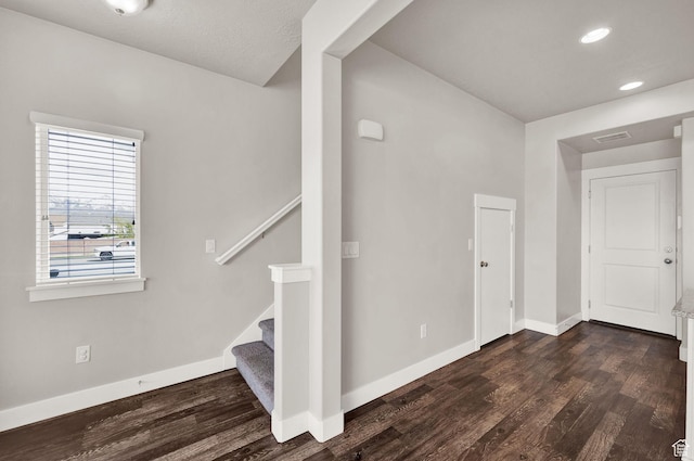 1712 W Naxos Ln, South Jordan, UT 84095 - foyer entrance with dark wood-type flooring, baseboards, stairs, and recessed lighting