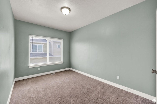 1712 W Naxos Ln, South Jordan, UT 84095 - spare room with carpet floors, a textured ceiling, and baseboards