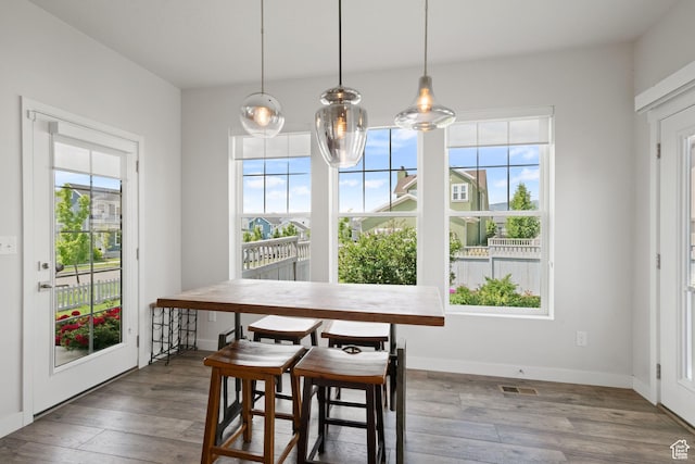 5206 W Mellow Way S, South Jordan, UT 84009 - dining space featuring healthy amount of natural light and wood finished floors