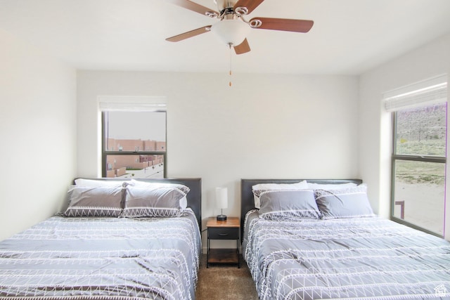 3853 S Red Valley Cir S Unit 23-A4, Moab, UT 84532 - carpeted bedroom with ceiling fan