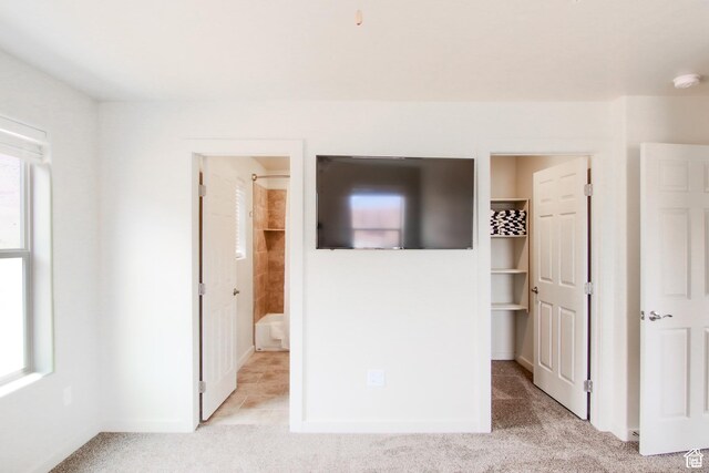 3853 S Red Valley Cir S Unit 23-A4, Moab, UT 84532 - unfurnished bedroom with light colored carpet