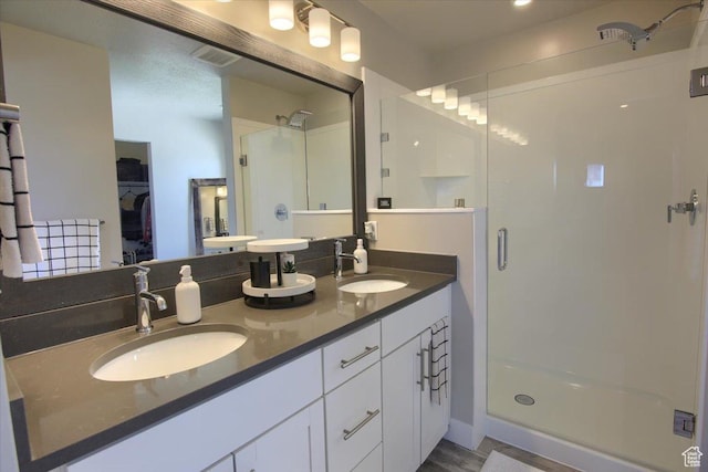 2895 S 2900 W, Syracuse, UT 84075 - bathroom with a shower stall, double vanity, and a walk in closet
