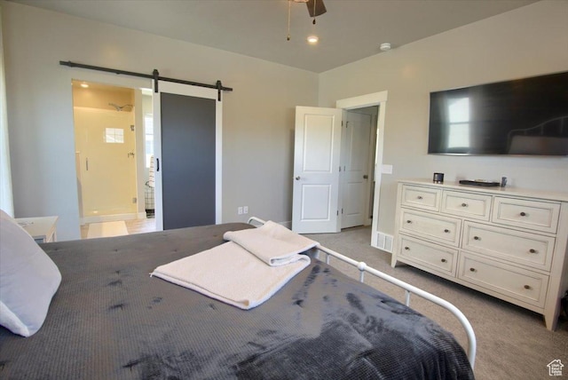 2895 S 2900 W, Syracuse, UT 84075 - bedroom featuring a barn door and light colored carpet