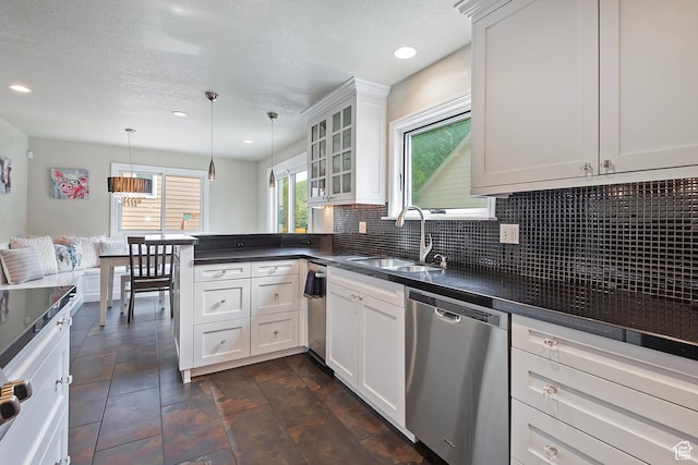 2300 Comstock Dr, Park City, UT 84060 - kitchen with dishwasher, a sink, healthy amount of natural light, a peninsula, and recessed lighting