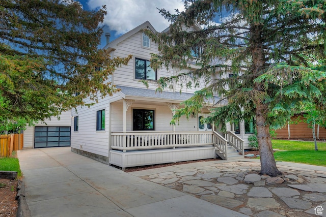 2300 Comstock Dr, Park City, UT 84060 - view of front of house featuring a porch, driveway, and an outbuilding