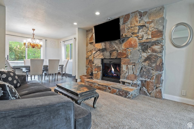 2300 Comstock Dr, Park City, UT 84060 - living room with baseboards, plenty of natural light, a chandelier, and a stone fireplace