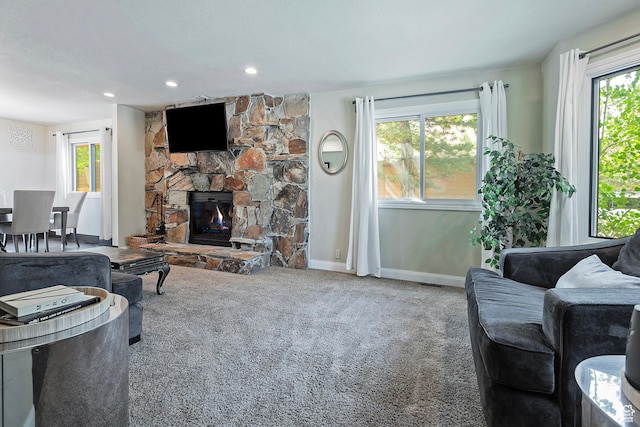 2300 Comstock Dr, Park City, UT 84060 - carpeted living room featuring baseboards, a stone fireplace, and recessed lighting