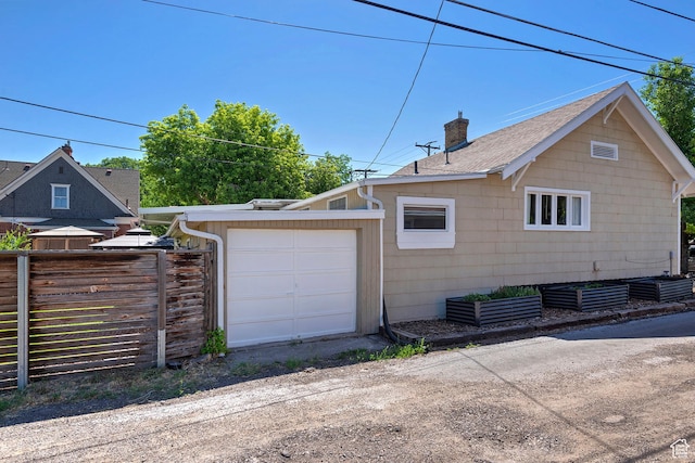 271 E Kensington Ave S, Salt Lake City, UT 84115 - view of property exterior with a chimney and roof with shingles