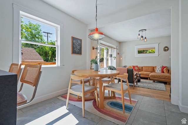 271 E Kensington Ave S, Salt Lake City, UT 84115 - tiled dining room featuring baseboards