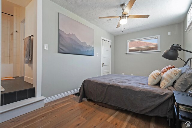 271 E Kensington Ave S, Salt Lake City, UT 84115 - bedroom featuring hardwood / wood-style floors, a textured ceiling, ceiling fan, and baseboards
