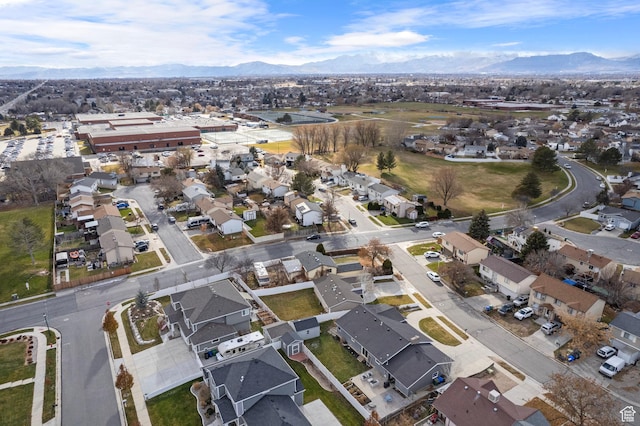 7935 S 2800 W, West Jordan, UT 84088 - aerial view of property and surrounding area featuring nearby suburban area and mountains