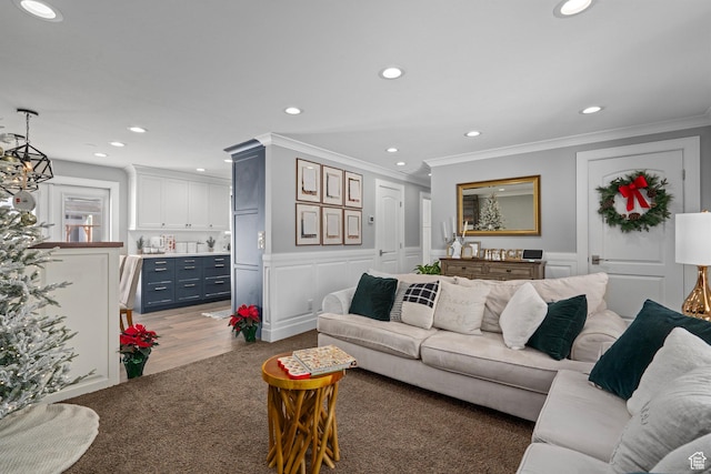 7935 S 2800 W, West Jordan, UT 84088 - living room featuring a decorative wall, crown molding, recessed lighting, wood finished floors, and wainscoting