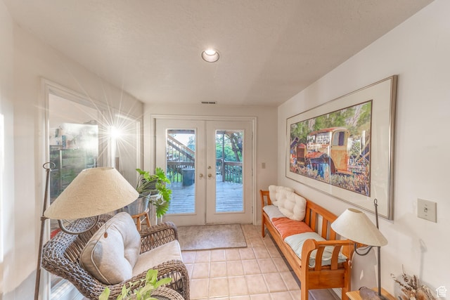 145 Deer Run Ln, Layton, UT 84040 - sitting room featuring french doors, light tile patterned floors, and recessed lighting