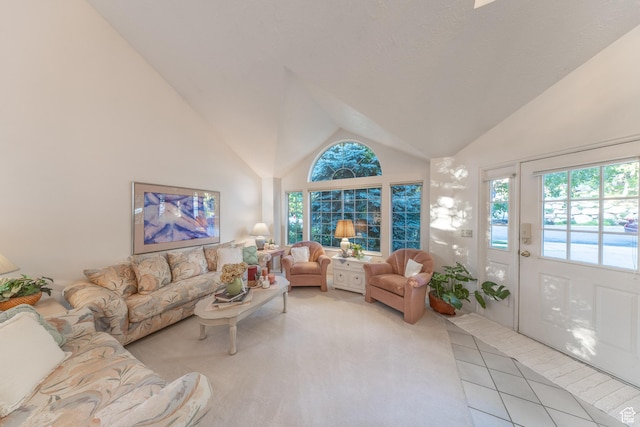 145 Deer Run Ln, Layton, UT 84040 - living room featuring high vaulted ceiling, healthy amount of natural light, and light tile patterned flooring
