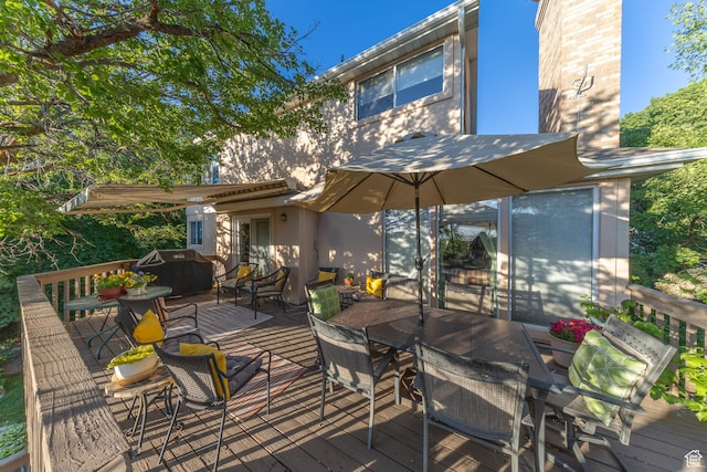 145 Deer Run Ln, Layton, UT 84040 - wooden deck with outdoor dining area and a grill