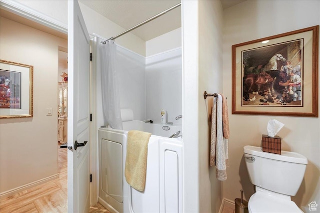 2198 W 1465 N, St George, UT 84770 - bathroom featuring toilet, shower / bath combination with curtain, and baseboards